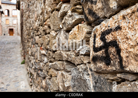 Swastika painted on wall Bellver de Cerdanya Catalunya Spain Stock Photo