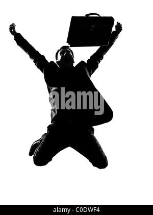 silhouette caucasian business man expressing winning winner energy success full length on studio isolated white background Stock Photo