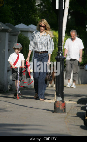 Claudia Schiffer walks her son Caspar to school in a pair of very large denim flares London, England - 13.05.08 Stock Photo