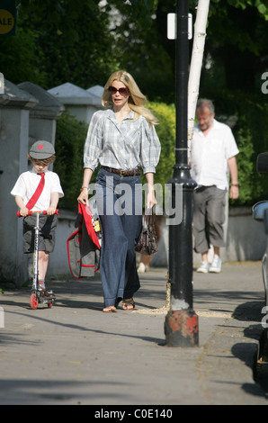 Claudia Schiffer walks her son Caspar to school in a pair of very large denim flares London, England - 13.05.08 Stock Photo