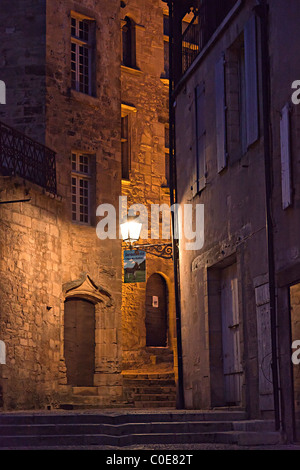 Old building with street light at dusk Sarlat Dordogne France Stock Photo