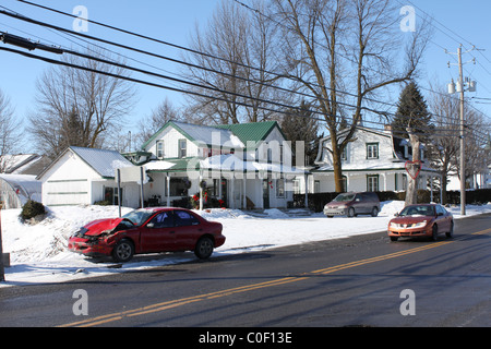 Traffic accident, damaged car on side of road Stock Photo