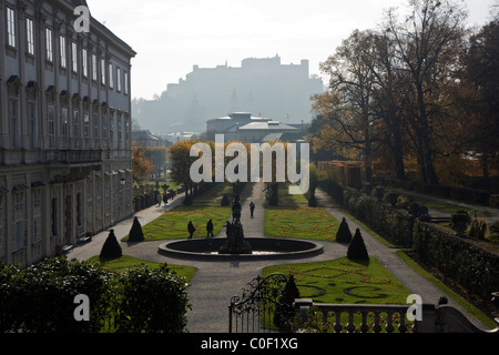 Mirabell garden and palace in Salzburg with view to the old Hohensalzburg fortress, Austria Stock Photo