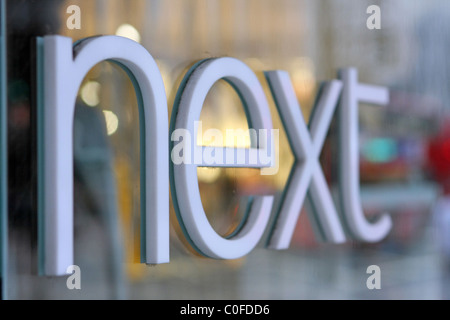 The 'Next' sign on one of their Oxford Street store windows Stock Photo