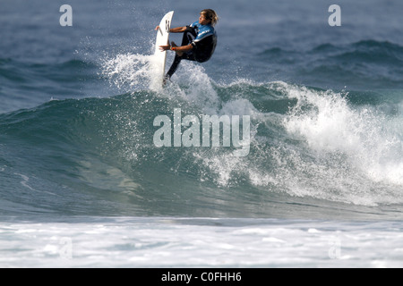 SURFER PRACTICING TRICK PRO SURFER PRO SURFER BALLITO DOLPHIN COAST SOUTH AFRICA 09 July 2010 Stock Photo