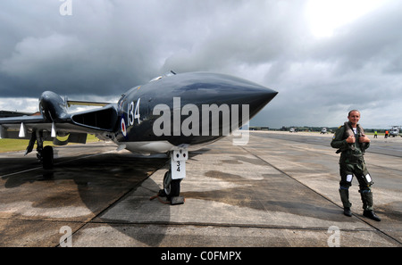 Lt Cdr Matt Whitfield who flies a Sea Vixen standing in front of the de Havilland DH.110 Sea Vixen Stock Photo