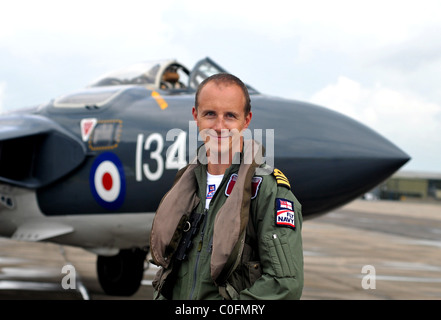 Lt Cdr Matt Whitfield who flies a Sea Vixen standing in front of the de Havilland DH.110 Sea Vixen Stock Photo