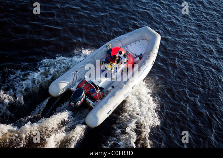 Aerial view of man driving Brig rigid inflatable boat / skiff ( RHIB ...