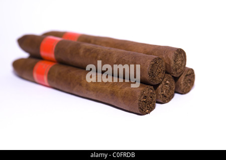 Six Cuban Cigars isolated on white. shallow depth of field Stock Photo