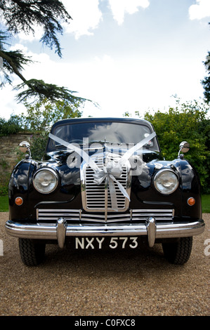 A black wedding car, parked outside Billesley Manor Hotel, Stratford-on-Avon, England, UK Stock Photo