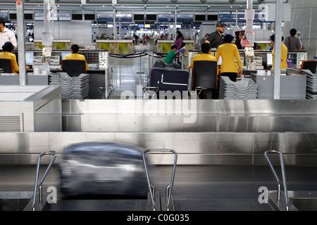 Baggage check-in counter at Kuala Lumpur International Airport in Stock ...