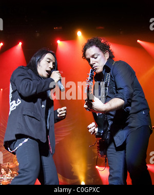 Arnel Pineda, Neal Schon Journey performing at Manchester Apollo theatre on the second gig of their UK tour Manchester, England Stock Photo