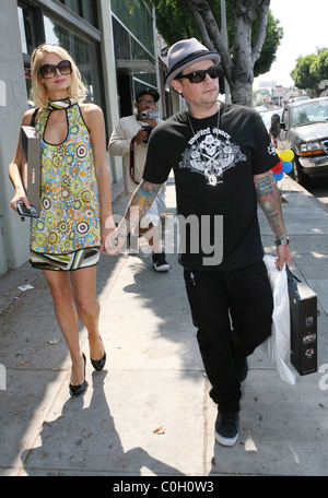 Paris Hilton and Benji Madden leaving the Apple Store on Melrose Avenue. Benji bought himself a MacBook Pro and Paris got a Stock Photo