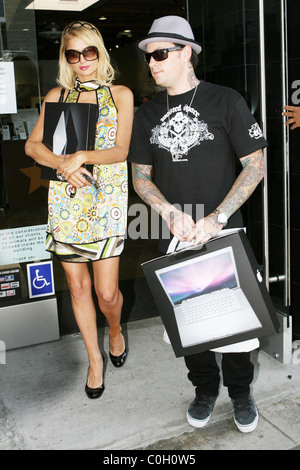 Paris Hilton and Benji Madden leaving the Apple Store on Melrose Avenue. Benji bought himself a MacBook Pro and Paris got a Stock Photo