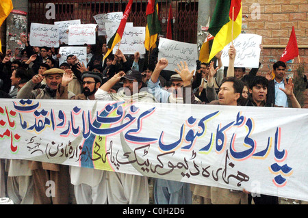 Supporters of Hazara Democratic Party (HDP) chant slogans in favor of their demands during a protest demonstration at Quetta Stock Photo