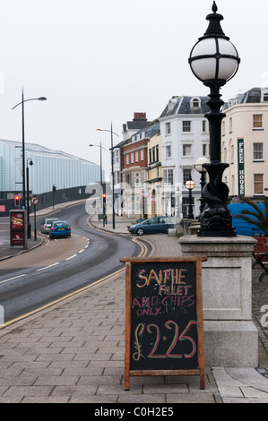 A sign for Saithe Fillets, a sustainable fish, outside a fish and chip shop in Margate Stock Photo