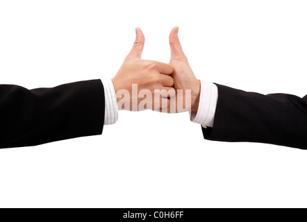 Closeup of a business hand shake and thumb up Stock Photo