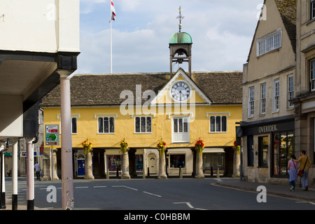 Colourful summer flowers decorate the historic old Cotswold Market Hall in Tetbury, Gloucestershire, UK Stock Photo