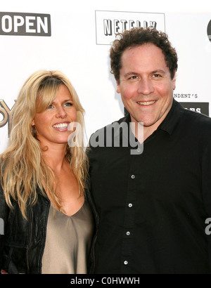 Jon Favreau and Joya Tillem The 'Hellboy 2: The Golden Army' premiere at the Mann Village Theater Los Angeles, California - Stock Photo