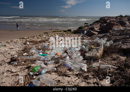 Plastic bottles litter the beach on an isolated part of South Padre Island on the Gulf of Mexico near Port Mansfield Texas Stock Photo