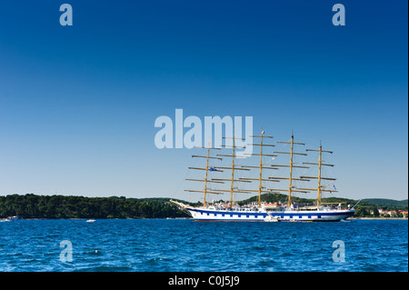 Classic sailboat anchored in Adriatic harbor. Turistic excursion ship, popular tourist attraction. Stock Photo
