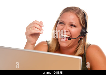 Attractive businesswoman Laughs as she talks on her phone headset. Stock Photo