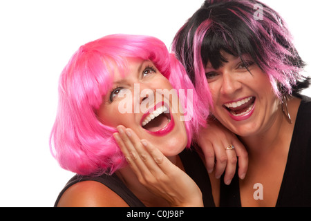 Portrait of Two Pink And Black Haired Smiling Girls Isolated on a White Background. Stock Photo