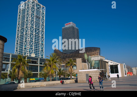 Young women rollerblading Passeig Maritim de la Barceloneta seaside promenade Barcelona Catalunya Spain Europe Stock Photo