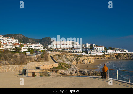 Hotels and beach at northern side of the La Punta church Sitges Catalunya Spain Europe Stock Photo