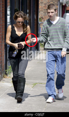 Kara Tointon and Charlie G. Hawkins who play Dawn Swann and Darren Miller in Eastenders, arrives at the Radlett branch of Pizza Stock Photo