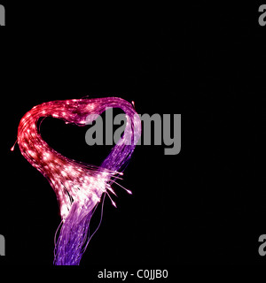 Heart shaped fiber optic cables in the light sensory room. Stock Photo