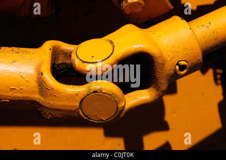 Universal joint couples shafts to deliver power at an angle Stock Photo