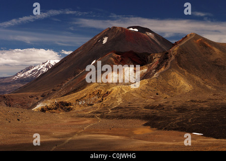 Red Crater and Mount Ngauruhoe, with Ruapehu background left,  viewed from the main path on the Tongariro Alpine Crossing. Stock Photo