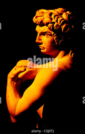 Copy of a sculpture of David Michelangelo on a black background Stock Photo