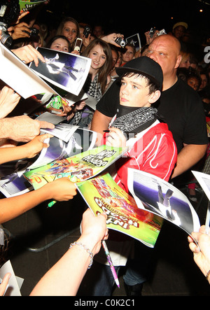 George Sampson signs autographs for adoring fans after his press night performance in 'Into the Hoods' at the NovelloTheatre Stock Photo