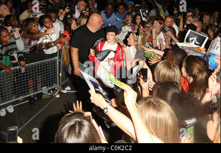 George Sampson signs autographs for adoring fans after his press night performance in 'Into the Hoods' at the NovelloTheatre Stock Photo