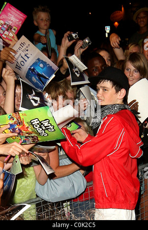 George Sampson signs autographs for adoring fans after his press night performance in 'Into the Hoods' at the NovelloTheatre Stock Photo