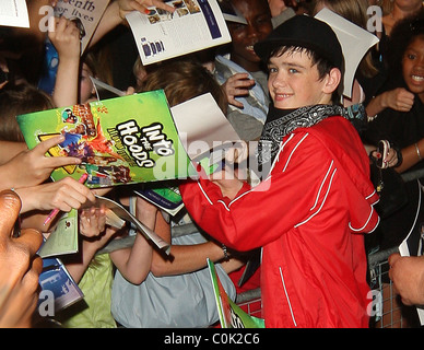 George Sampson signs autographs for adoring fans after his press night performance in 'Into the Hoods' at the NovelloTheatre Stock Photo