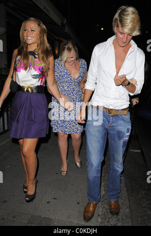 Kimberley Walsh arrives at The Burlington Club with younger sister Amy Walsh to celebrate her older sister Sally Walsh's 30th Stock Photo