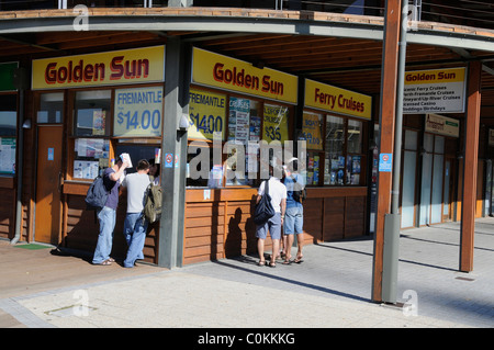 Tourists at one of the ferry and river excursions booking offices in Barrack Square in Perth, Western Australia,Australia Stock Photo