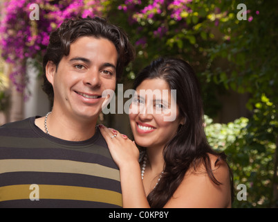Loving Hispanic Couple Portrait Enjoying Each Other Outdoors. Stock Photo