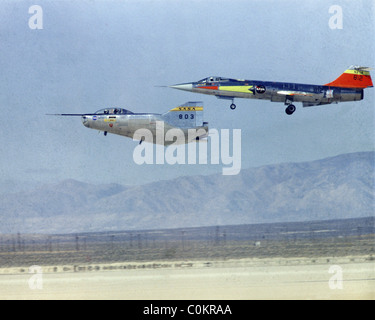 The M2-F2 lifting body returns from a research flight with an F-104 flying chase. Stock Photo