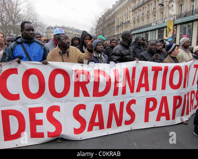 Paris, France,  Demonstration, African Immigrants Without Documents, Coordination Sans Papiers, Marching, Holding protest Banner, Migrants Europe, protesters multiracial human rights, undocumented people, illegal migrants Stock Photo