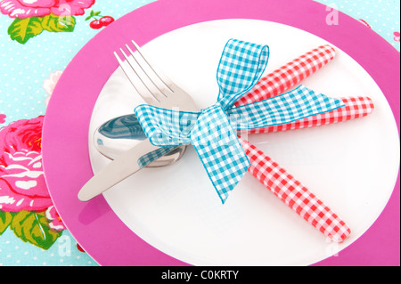 covered table with colorful dishes and cutlety Stock Photo