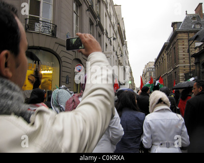 Paris, France, Public Demonstration, in Support of Libyan Revolution, Man Taking photos with Smartphone 'Arab Spring Protests' Movement, walk, phones crowd Stock Photo