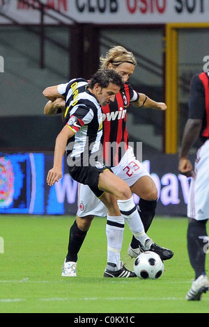 Juventus striker Alessandro Del Piero, center, followed by teammate Giorgio  Chiellini, left, with other teammates, warms-up next to an Italian Serie B  second division sign, at bottom, before the start of the