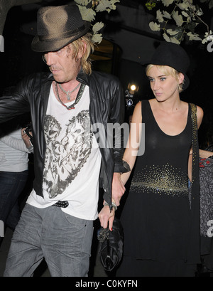 Rhys Ifans and new girlfriend Kimberly Stewart leave Bungalo