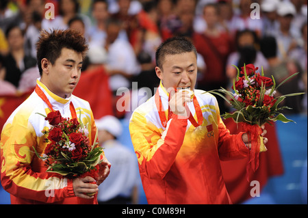 Gold medalist Ma Lin celebrates,. China made a clean sweep of medals in the Men's Singles Table Tennis competition at the Stock Photo