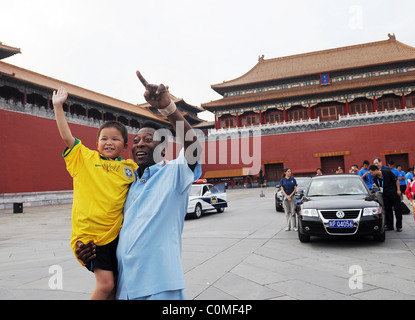 Former Brazilian footballing legend Pele at China's Imperial Palace where he presented signed footballs and football shirts to Stock Photo