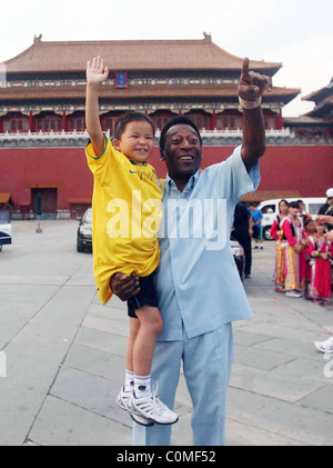 Former Brazilian footballing legend Pele at China's Imperial Palace where he presented signed footballs and football shirts to Stock Photo